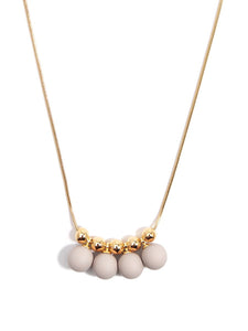 Zenzii Shiny Metal Necklace With Painted Metal Circle